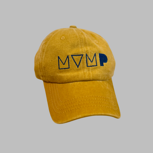 Yellow cap with MVMP logo on a gray background