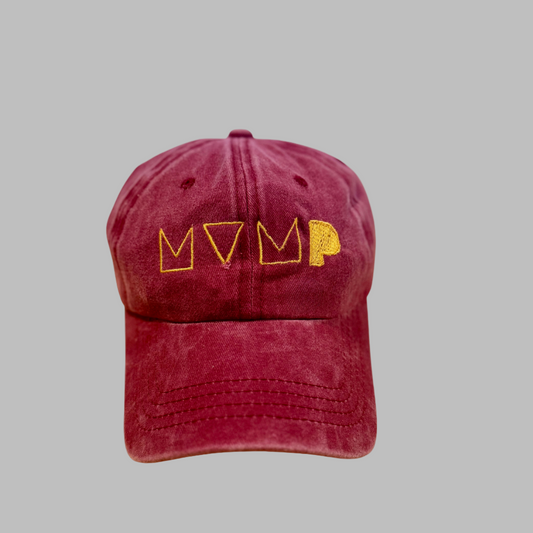 Maroon cap with yellow 'MVMP' embroidery on a gray background