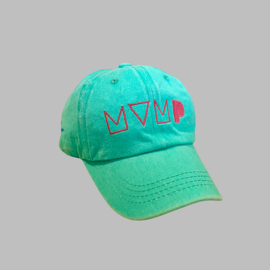 Teal cap with pink logo on a gray background